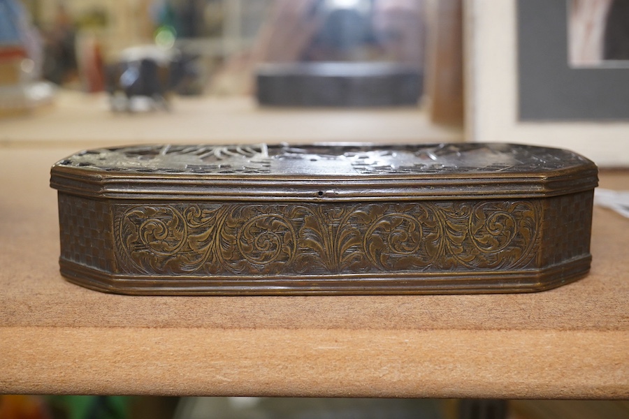 An 18th century Dutch inscribed and reticulated brass tobacco box, 15.5cm in length. Condition - fair